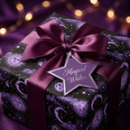 Celestial purple wrapping paper with sun and moon pattern, satin bow, and star tag by Wrapped Studios.