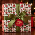 Vintage elf Christmas wrapping paper with green satin bow and Merry Christmas tag by Wrapped Studios.