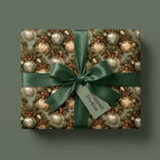 Luxury Christmas wrapping paper with vintage ornament pattern and green satin bow by Wrapped Studios.