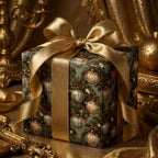 Luxury Christmas wrapping paper with a vintage ornament pattern and large gold bow by Wrapped Studios.