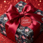 Christmas wrapping paper by Wrapped Studios with navy pine pattern, large red bow, and Happy Holidays tag.