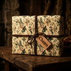 Vintage holly Christmas wrapping paper on a gift box with wooden Cheers tag by Wrapped Studios.