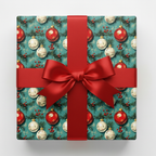 Gift wrapped in teal Christmas wrapping paper with ornament pattern and red satin bow.