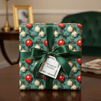Elegant Christmas gift wrapped in teal paper with an ornament pattern and tied with a forest green satin ribbon.