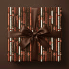 Masculine cigar wrapping paper with a brown satin bow by Wrapped Studios. Vintage Father's Day gift wrap.