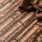 Cigar wrapping paper with a brown bow, masculine birthday gift wrap by Wrapped Studios.