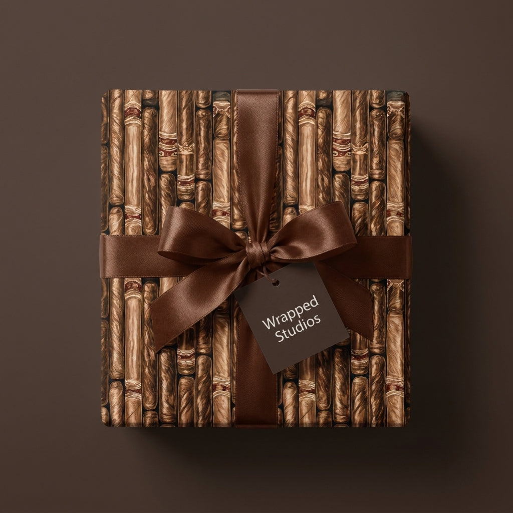 Cigar wrapping paper on a masculine gift box with a brown satin bow, by Wrapped Studios.