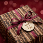 Vintage book wrapping paper by Wrapped Studios with burgundy ribbon and wooden 'Just for You' gift tag.