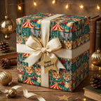 Whimsical circus birthday wrapping paper with a cream ribbon on a gift box by Wrapped Studios.