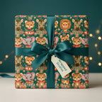 Vintage circus animal wrapping paper with a teal ribbon by Wrapped Studios.