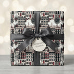 Luxury NYC townhouse holiday wrapping paper with a black ribbon bow by Wrapped Studios.