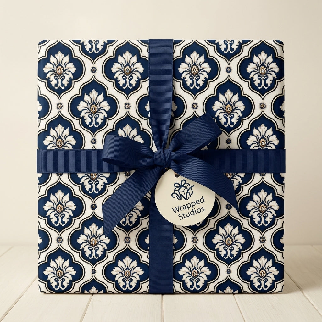 Luxury navy blue damask wrapping paper with a matching ribbon and gift tag by Wrapped Studios.