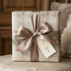 Elegant vintage damask wedding gift wrap with luxury champagne satin ribbon bow by Wrapped Studios.