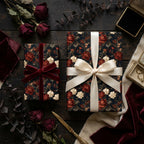 Dark moody floral wrapping paper with luxury velvet and satin ribbons by Wrapped Studios.