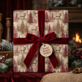 Vintage deer Christmas wrapping paper with a red velvet bow by Wrapped Studios.