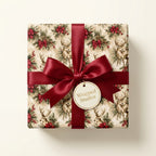 Vintage deer Christmas wrapping paper by Wrapped Studios, tied with a luxury red satin bow.