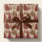 Rustic woodland Christmas wrapping paper with deer, tied with a brown satin bow by Wrapped Studios.