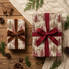 Rustic woodland Christmas wrapping paper with deer and red ribbons by Wrapped Studios.
