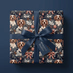 Spaniel dog Christmas wrapping paper with a blue satin bow on a holiday gift box by Wrapped Studios.