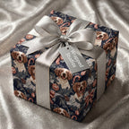 Spaniel dog Christmas wrapping paper with a silver bow on a luxury gift box by Wrapped Studios.