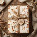 Watercolor dog wrapping paper with a cute puppy pattern and rustic twine bow, from Wrapped Studios.
