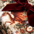 Fantasy dragon wrapping paper with luxury floral design and red velvet bow by Wrapped Studios.