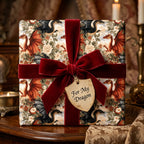 Fantasy dragon wrapping paper with floral design and red velvet ribbon by Wrapped Studios.