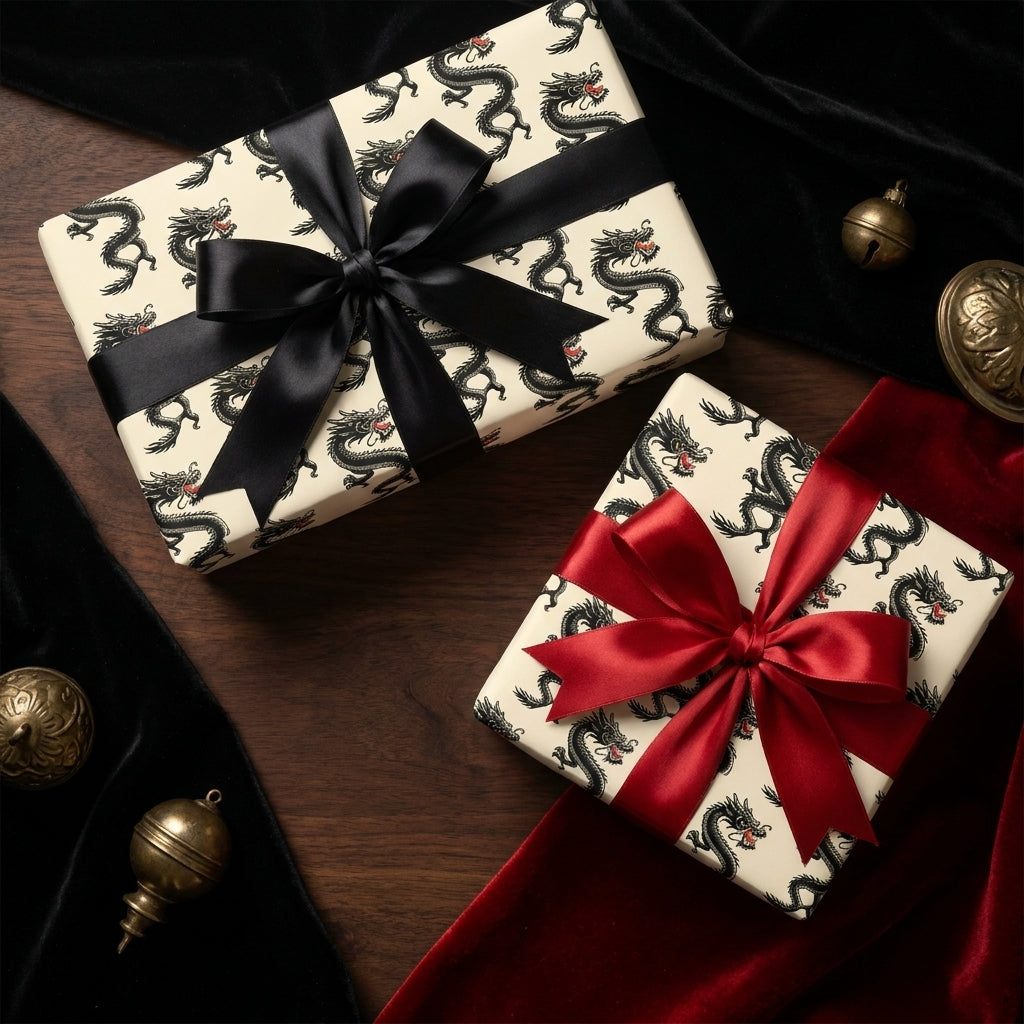 Luxury Chinese dragon wrapping paper with black and red satin bows by Wrapped Studios.