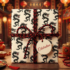 Chinese New Year dragon wrapping paper with red and black cord on a gift box by Wrapped Studios.