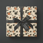 Music themed drum kit wrapping paper with a black bow on a square gift box, by Wrapped Studios.