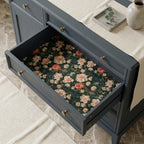 Vintage floral wrapping paper used as a luxury drawer liner in a dresser by Wrapped Studios.