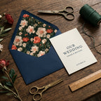 Elegant navy blue wedding invitation with vintage floral envelope liner by Wrapped Studios.