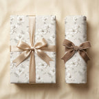 Luxury floral wedding gift wrap with champagne satin and velvet bows by Wrapped Studios.