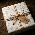 Vintage floral wrapping paper on a rustic gift box with twine and For Him tag by Wrapped Studios.