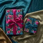 Luxury floral wrapping paper with vibrant botanical designs and elegant satin bows by Wrapped Studios.