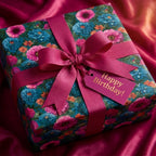 Teal floral birthday wrapping paper with luxury magenta ribbon and tag by Wrapped Studios.
