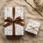Luxury vintage floral wrapping paper by Wrapped Studios on gifts with a brown velvet ribbon.