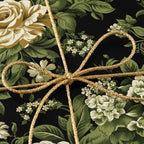 Elegant floral wrapping paper with gold cord ribbon.