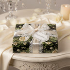 Elegant gift wrapped in floral congratulations wrapping paper with lace ribbon.