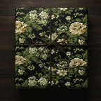 Elegant floral wrapping paper featuring roses and a brown cord bow from Wrapped Studios.
