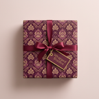 Burgundy damask wrapping paper with matching ribbon and gift tag.
