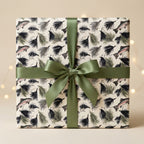 Rustic fly fishing wrapping paper with trout and a green bow by Wrapped Studios.