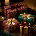 Luxury Christmas wrapping paper in burgundy and gold trellis with velvet ribbons by Wrapped Studios.