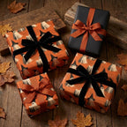 Vintage ghost Halloween wrapping paper with black velvet ribbons on rustic wood by Wrapped Studios.
