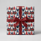 Whimsical Christmas gnome wrapping paper with a red satin bow on a gift box, by Wrapped Studios.