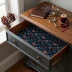 Vintage floral wrapping paper used as a drawer liner. Dark moody botanical gift wrap by Wrapped Studios.
