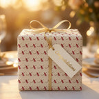 Graduation wrapping paper with diploma pattern, gold ribbon, and congratulations tag by Wrapped Studios.