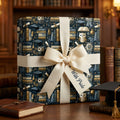 Academic-themed graduation wrapping paper featuring owls and books, tied with a cream ribbon by Wrapped Studios.