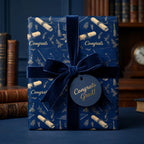 Luxury navy and gold graduation wrapping paper with a velvet bow and congrats tag by Wrapped Studios.