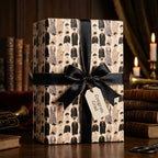 Vintage graduation wrapping paper by Wrapped Studios with a black satin bow and Congrats Grad tag.